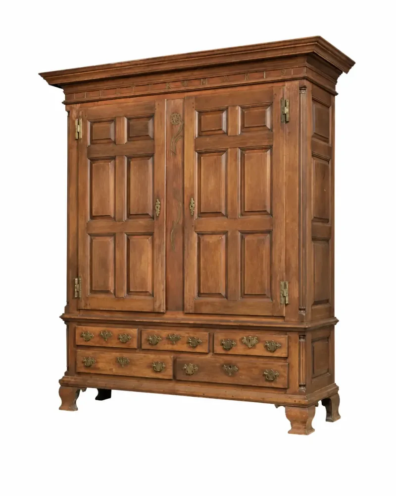Pennsylvania walnut raised-panel schrank, circa 1760, Chester County, PA., isolated on a clean white background